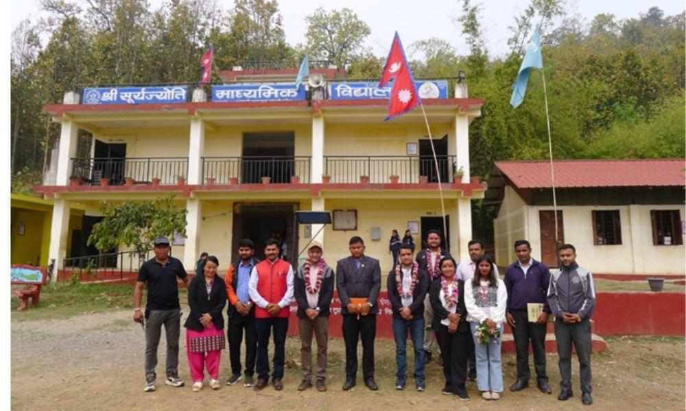 R4C team having been greeted with Mala and Tika at a school that we support in Hupsekot.
